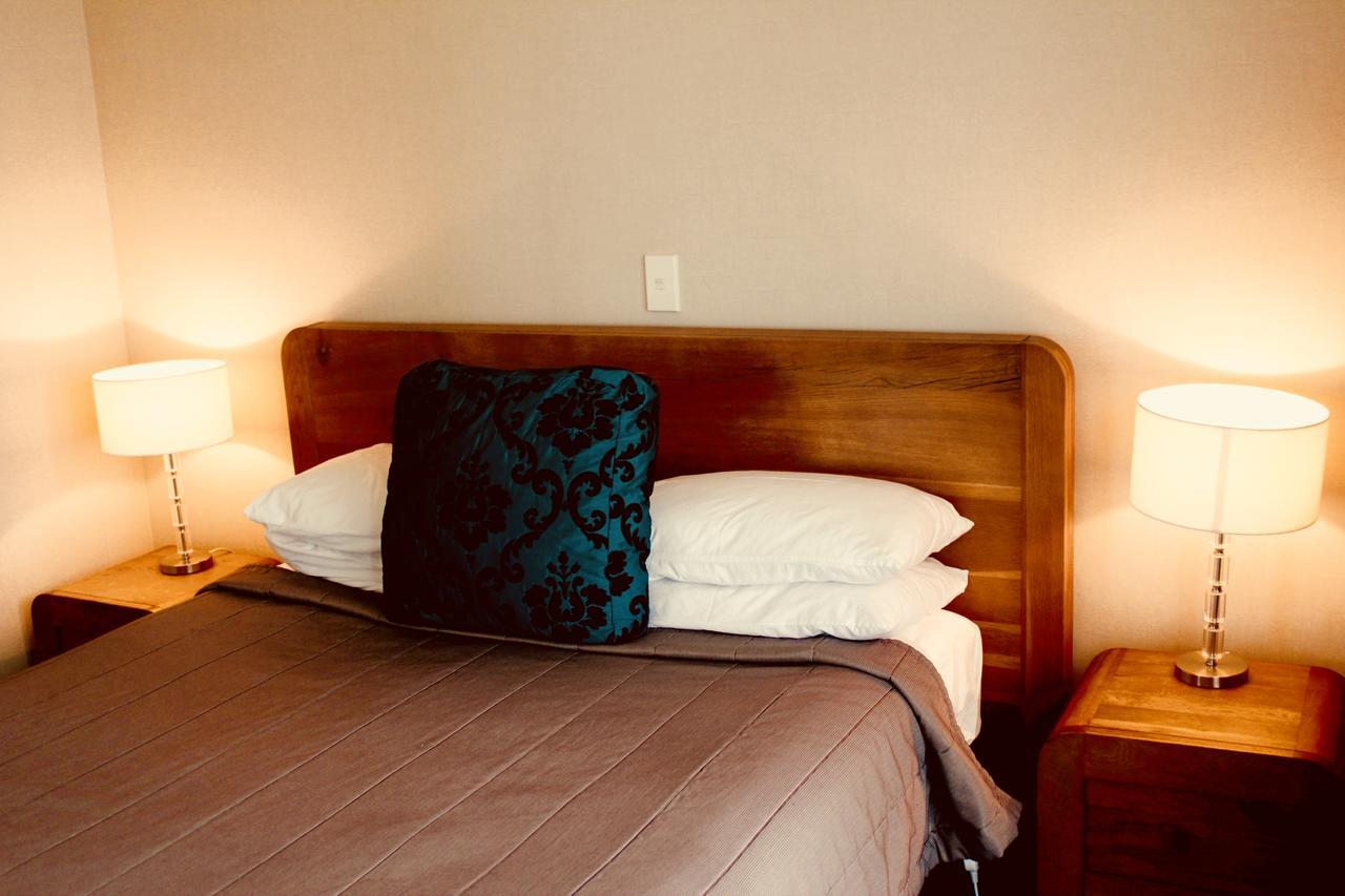 Hotel The Nautilus Napier Exterior foto A bed with a pillow